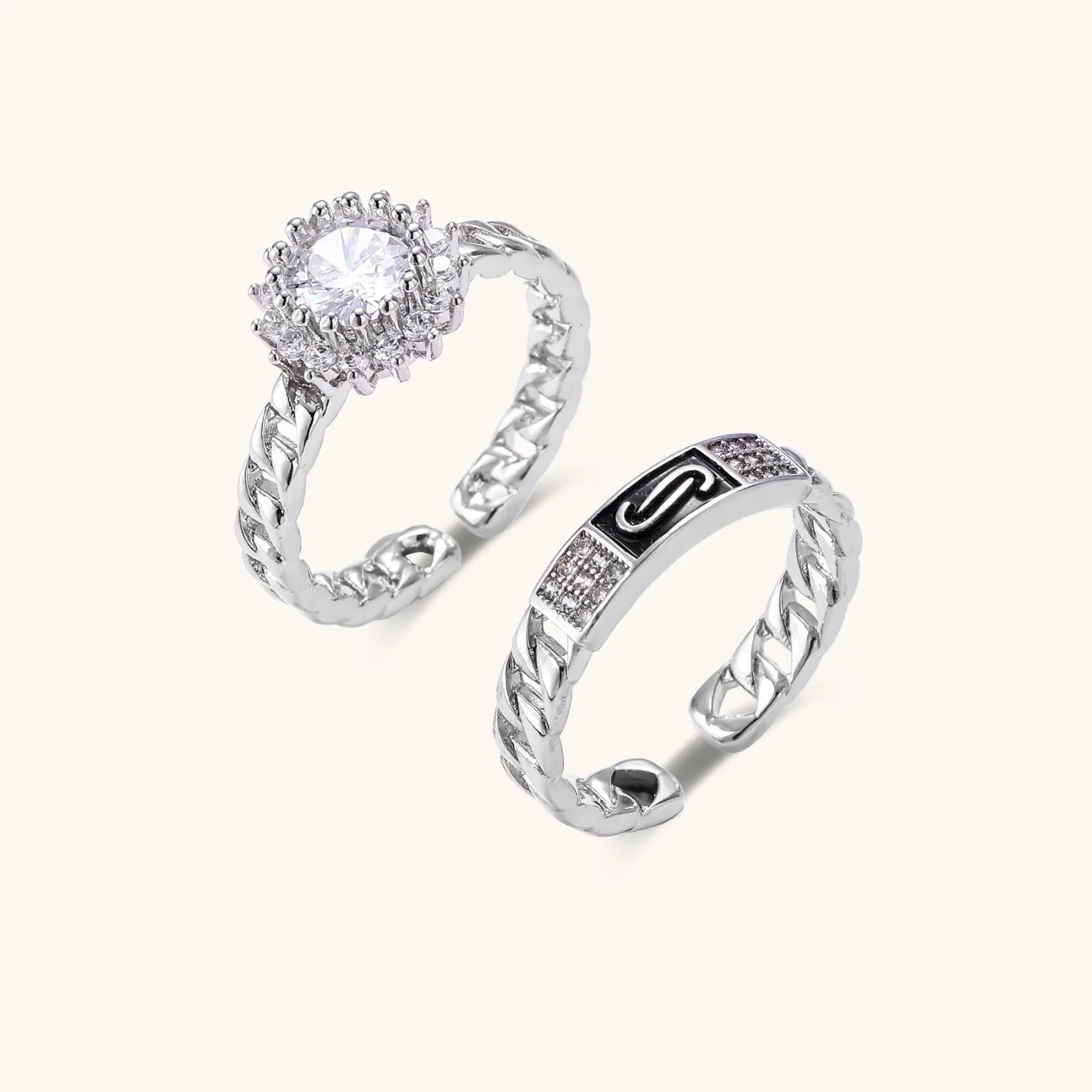 Two adjustable white gold plated rings with chain-link bands, featuring cubic zirconia halo and enamel details